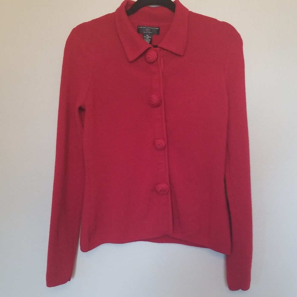 Sarah Spencer red sweater